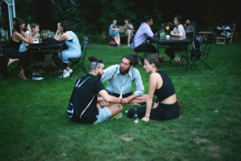 people sitting in the gras